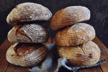 Homemade sourdough bread on the wooden background
