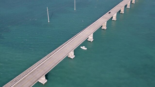 Aerial Time Lapse Shot Of Vehicles Moving On Seven Mile Bridge, Drone Flying Forward Over Sea -  Florida Keys, Florida