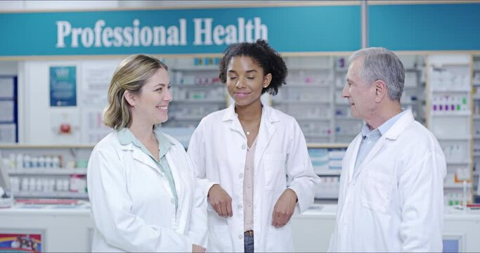 Insurance, trust or commitment from group of pharmacists, medical and healthcare professionals in pharmacy. Portrait of diverse, smiling and friendly colleagues selling medication and ready to help