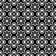 Simple regular graphic design with abstract shapes...Black and white design as seamless pattern. Abstract background for textile design, surface textures, wrapping paper.Simple regular graphic design.