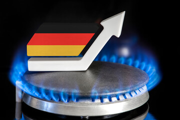 Gas price. Rise in gas prices in Germany. A burner with a flame and an arrow up, painted in the...