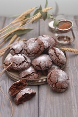 Chocolate chip cookies on a plate, with a beautiful background.