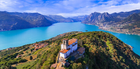Italian lakes scenery. Amazing Iseo lake aerial view.  one of the most beautiful places - Shrine of Madonna della Ceriola in Monte Isola - scenic island