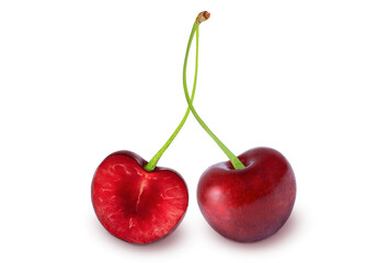 Cherries on an isolated white background. Whole and half cherries