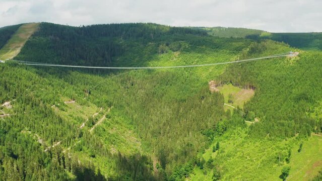 Aerial view of suspension Sky Bridge 721 in mountains, Dolni Morava, Czech Republic