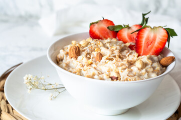 Oatmeal breakfast  mix of rolled oats, milk  and nuts