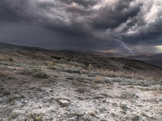 Lightning in a stormy sky. Psychedelic landscape. Thunderstorm with lightning strikes