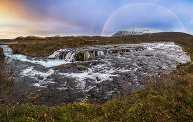 Picturesque waterfall Bruarfoss autumn view. Season changing in southern Highlands of Iceland.