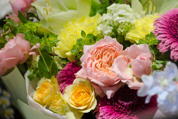 colorful bouquets of pink flowers on the showcase close