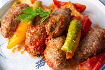 Traditional Homemade Turkish Food Kofte - Kofta with Tomato Sauce and Potatoes. (Turkish name; Izmir kofte)