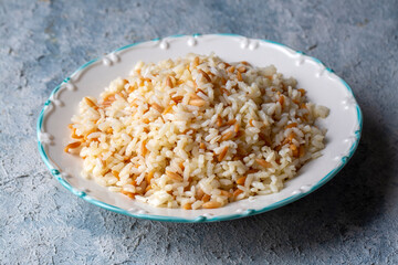 Traditional delicious Turkish food; Turkish style rice pilaf (Turkish name; Arpa sehriyeli pirinc pilavi)