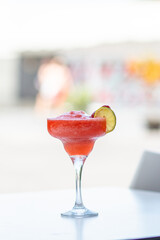 preparation of strawberry cocktail in bar