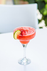 preparation of strawberry cocktail in bar