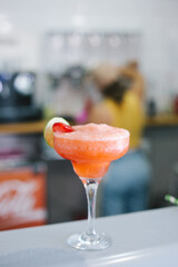 preparation of strawberry cocktail in bar