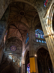 Ceilings, interiors and stained glass windows of the Basilica of St Michel in Bordeaux France