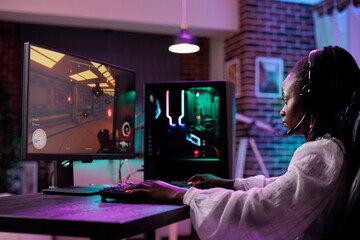 Young adult playing rpg video games tournament on computer, attending online gaming championship with multiple players. Female action player streaming esport competition on internet.