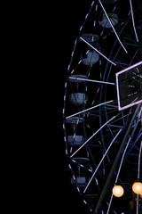 Ferris wheel illuminated at night