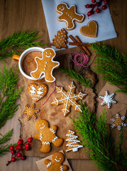 Christmas homemade gingerbread cookies, gingerbread man on wooden table