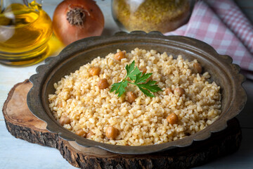 Traditional delicious Turkish food; bulgur pilaf with chickpea (Turkish name; nohutlu bulgur pilavi)