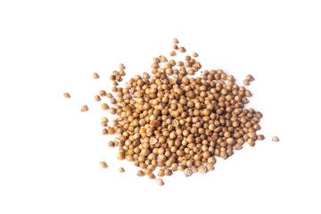 Pile of Coriander seeds isolated on white background
