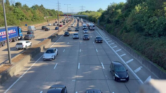 Busy motorway , rush hour scene as traffic heavily piles up on m25 near heathrow