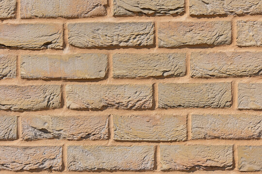 Background - brick lined with yellow decorative brick