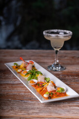 Fish tiradito in different peppers, typical dish of Peru..