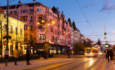 Fototapeta na wymiar Twilight view of Debrecen streets with motion blur, Hungary