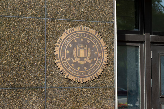 Washington, DC, USA - June 21, 2022: The symbol of the Federal Bureau of Investigation (FBI) is seen outside its headquarters, the J. Edgar Hoover F.B.I. Building in Washington, DC.