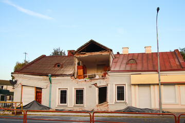 Defocus huge ruins, wreck in Ukraine, war. House after russian attack. Ruined home background. Kyiv home. Close-up. Russian terrorism. Russian rocket. Out of focus