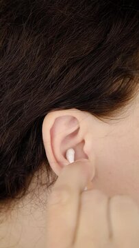 ear cleaning with a cotton swab closeup. High quality footage