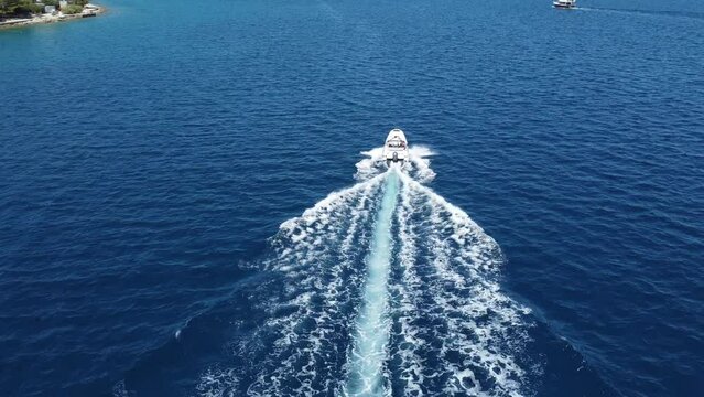 On top of a boat speeding in Croatia