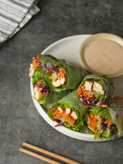 Vegetable spring roll, fresh roll salad made from mix vegetables and roasted chicken. 