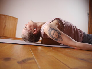 Blonde woman in different Yoga and Pilates poses.