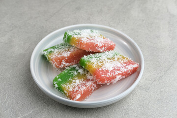 Sentiling or ongol-ongol is a traditional food from Indonesia. Made from cassava sprinkled with grated coconut
