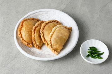 Kue Pastel or Jalangkote, Indonesian traditional snack filled with carrot and potatoes. 