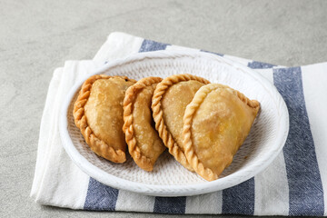 Kue Pastel or Jalangkote, Indonesian traditional snack filled with carrot and potatoes. 