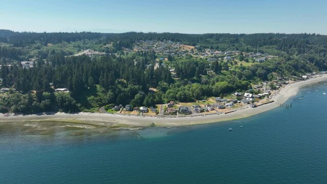 Aerial shot of the Clinton, Washington waterfront community from the ocean's perspective.