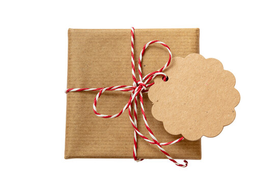 Christmas gift box empty card. Red white twisted string on brown present