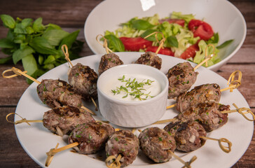 Recipe of kefta, beef skewer, Traditional homemade, with Greek yoghurt sauce, garlic, savory, Arabic and Libanese food, High quality photo