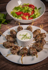 Recipe of kefta, beef skewer, Traditional homemade, with Greek yoghurt sauce, garlic, savory, Arabic and Libanese food, High quality photo