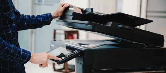Copier printer, Close up hand office man press copy button on panel to using the copier or...