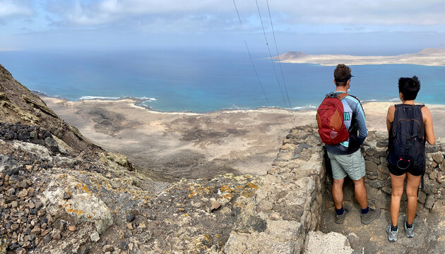 Two Hicker. Panoramic view near Famara Risco, Lanzarote. Vertical Location: north of Lanzarote, Canary Islands, Spain. Ocean view.