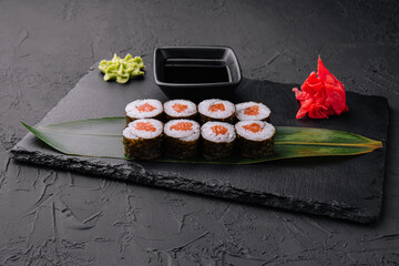 Japanese big maki sushi on black board