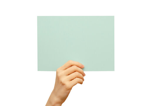 Empty color poster in hand. Isolated on a white background. Copy space