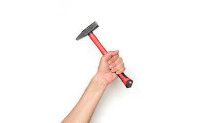 Male hand holding a hammer with a red handle on a white background