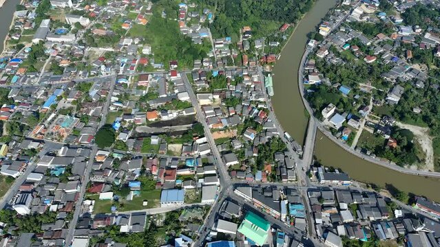 aerial view of house and building in downtown area, shot scene town from scenic skyline at Pattani city street urban in Thailand, beautiful road from roof sky