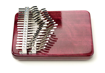Top view wooden african instrument Kalimba musical isolated on white background. play on hands and...