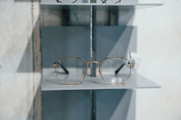 Close up view of glasses that is on the shelves indoors in the store