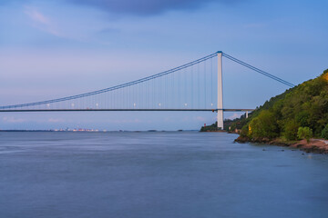 Jiangyin Yangtze River Bridge and night view of the Yangtze River in Jiangsu Province, China